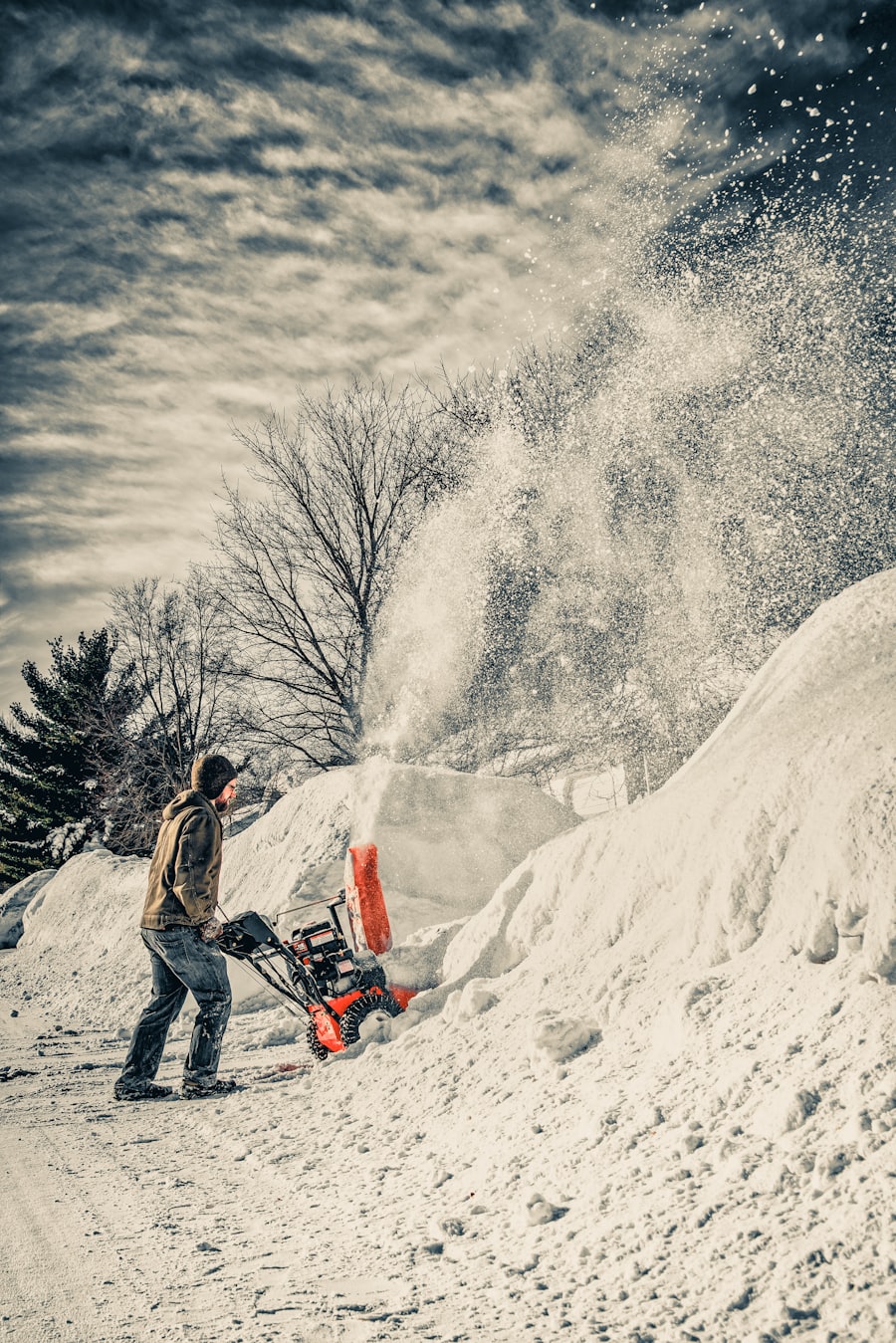 Clearing a snow covered driveway in Ramsey, Minnesota