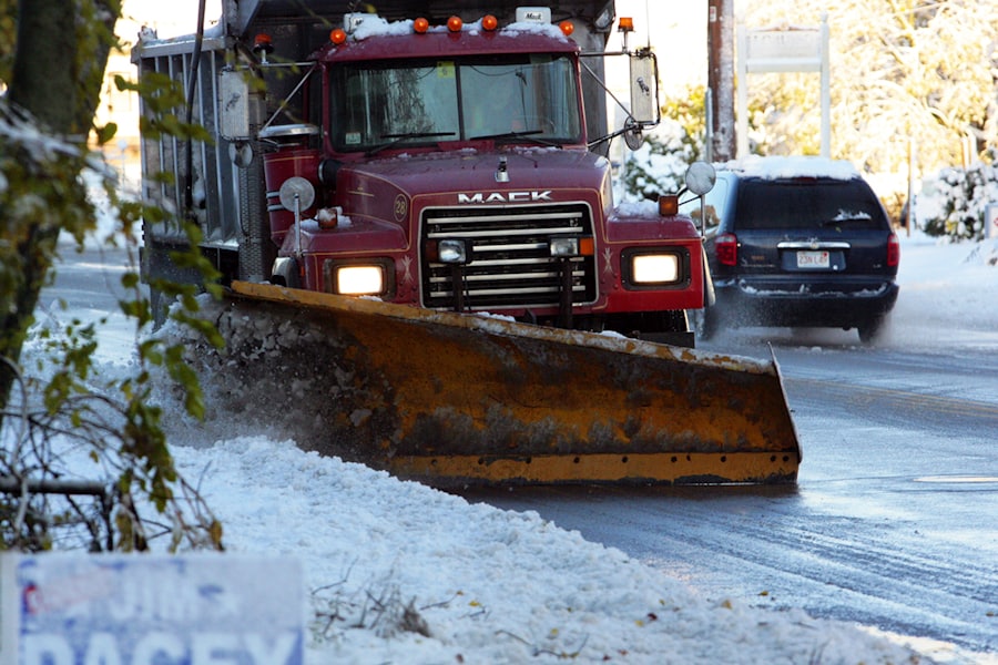 Snow plowing a driveway in Ramsey, Minnesota