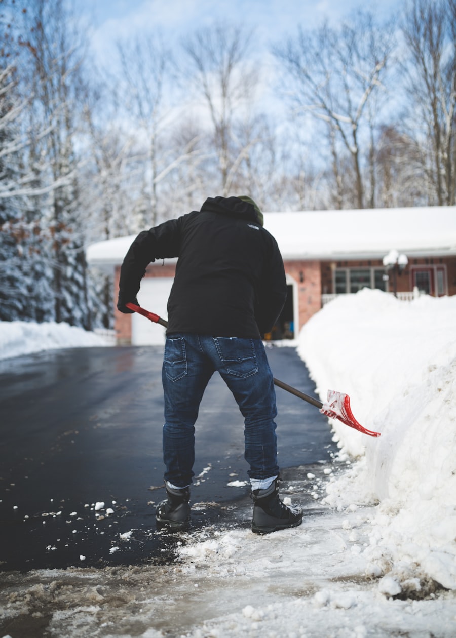 Shoveling snow from a sidewalk and steps in Ramsey, Minnesota